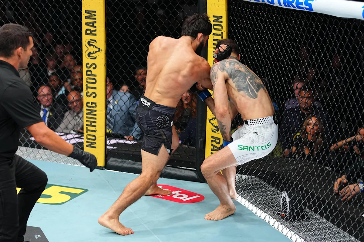 Arman Tsarukyan attacks Mauricio Ruffy against the fence at UFC 331