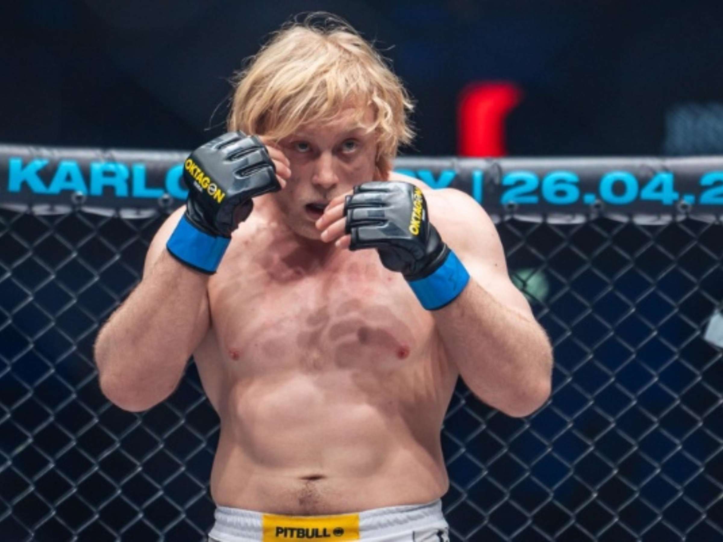 Frederic Vosgrone prepares to compete inside the Oktagon MMA cage