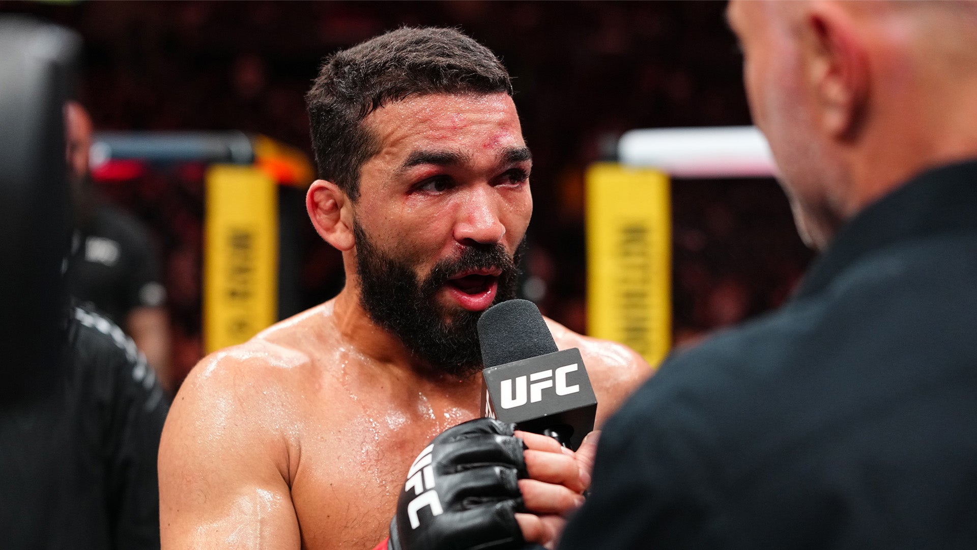 Patricio Pitbull speaks in the Octagon after stopping Doo Ho Choi at UFC 331