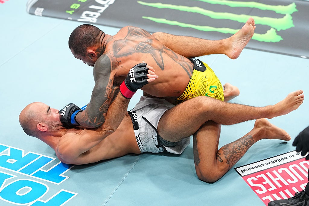 Joanderson Brito controls Giga Chikadze on the canvas during their UFC 331 bout