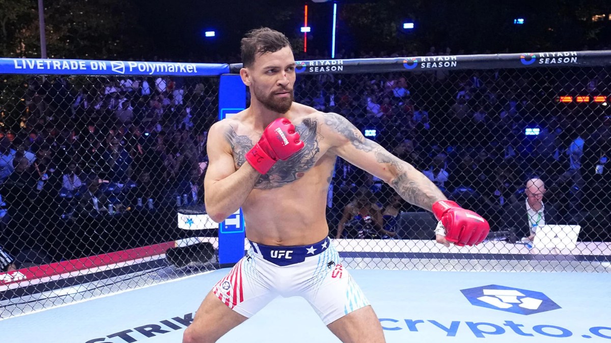 Mauricio Ruffy celebrates in the Octagon at UFC Freedom 250