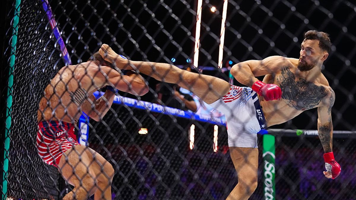 Mauricio Ruffy kicks Michael Chandler during UFC Freedom 250
